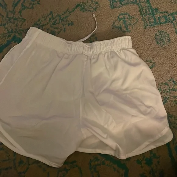 selling these white nike shorts , size small. Never worn. No rips or stains - Picture 2 of 3